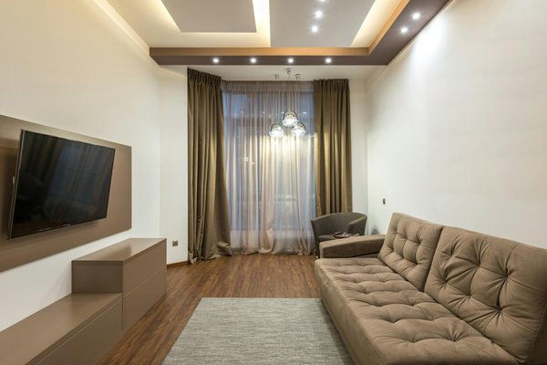 How can you incorporate a home cinema in a UK terraced house without compromising space?