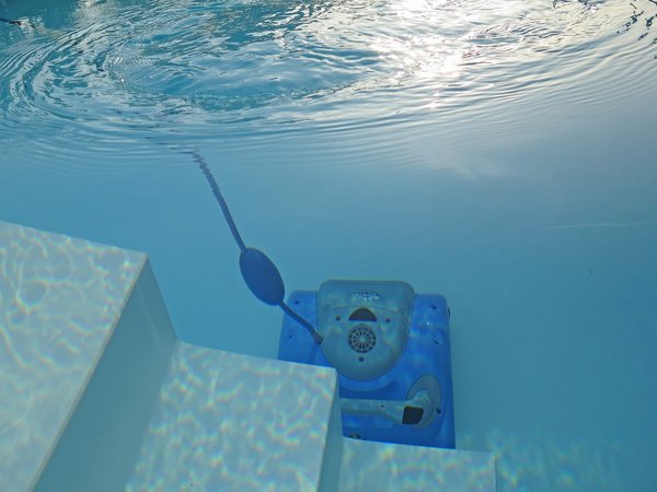 What are the implications of a variable speed pump for UK home swimming pool owners?