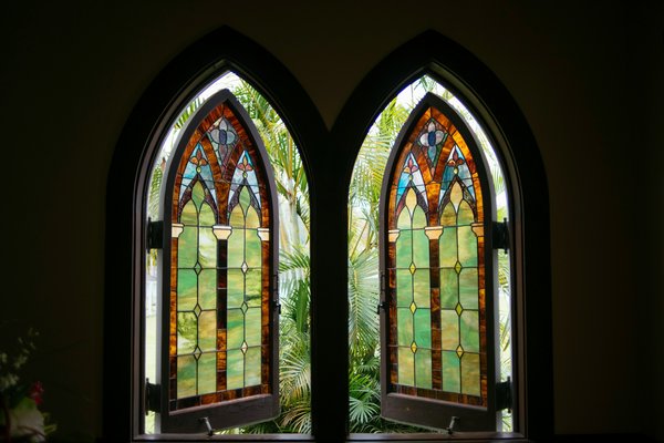 How do you preserve the historical integrity of stained glass windows in a Chester cathedral area home?